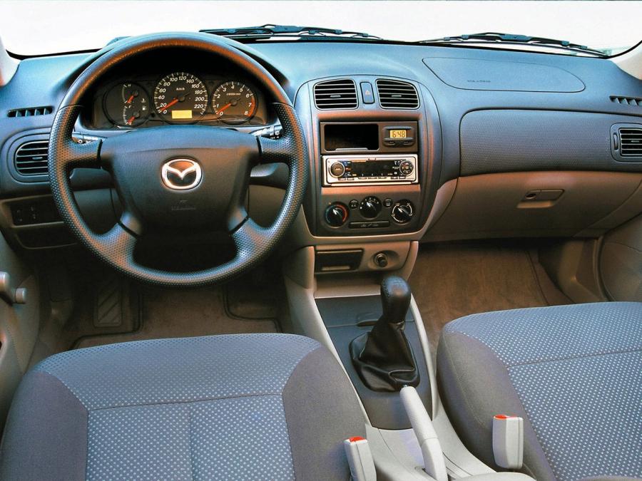  Mazda 323 Sedan 1998 года  (фото 2 из 7)